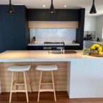 Modern Kitchen in a Loft with white stone island benchtop— Stoneworks in NSW